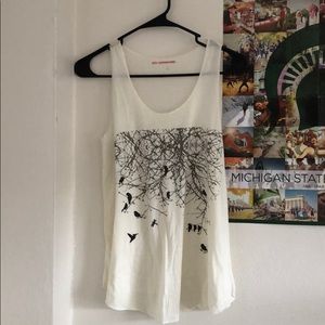 Birds in tree tank top